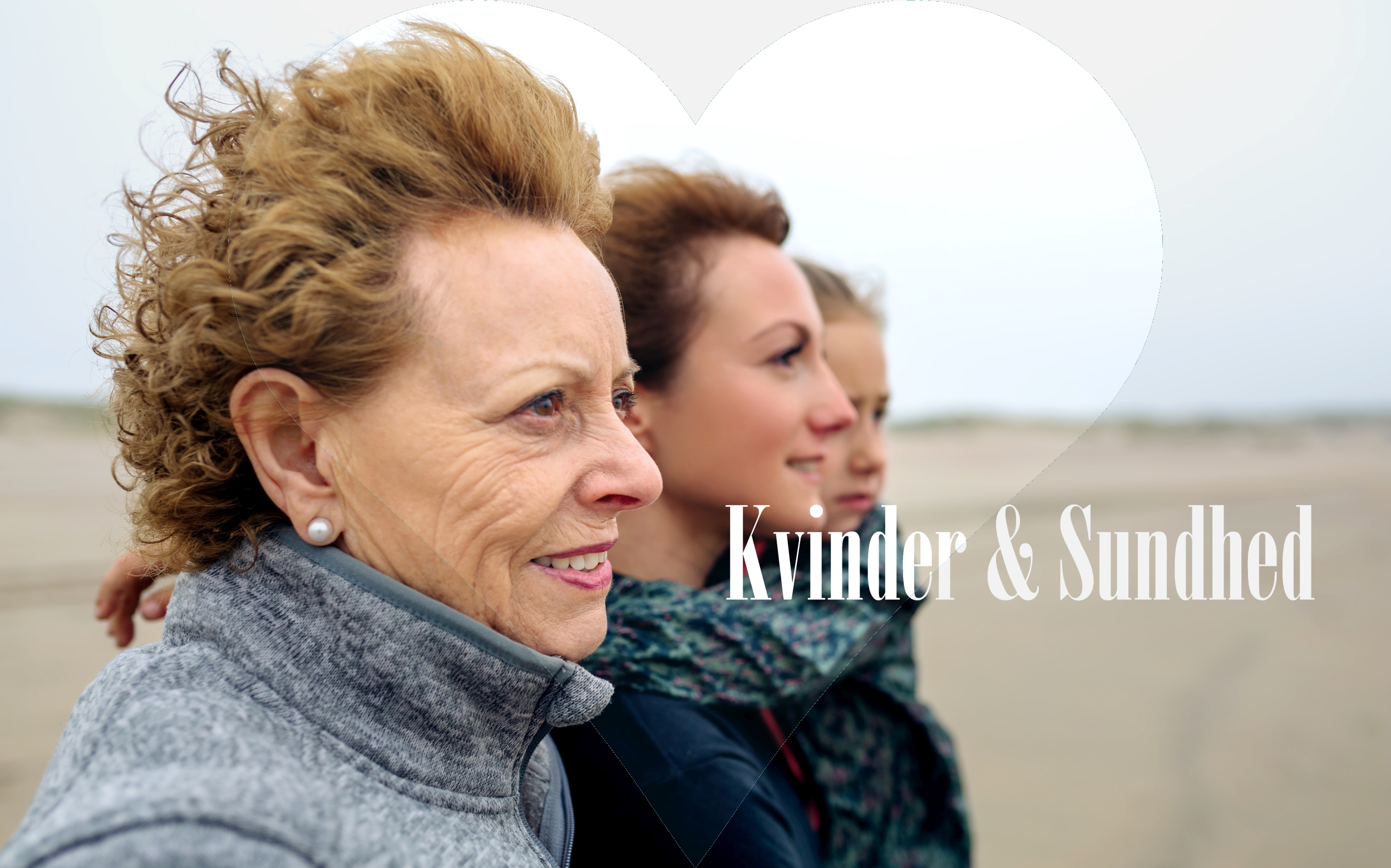 Three generations female looking at sea